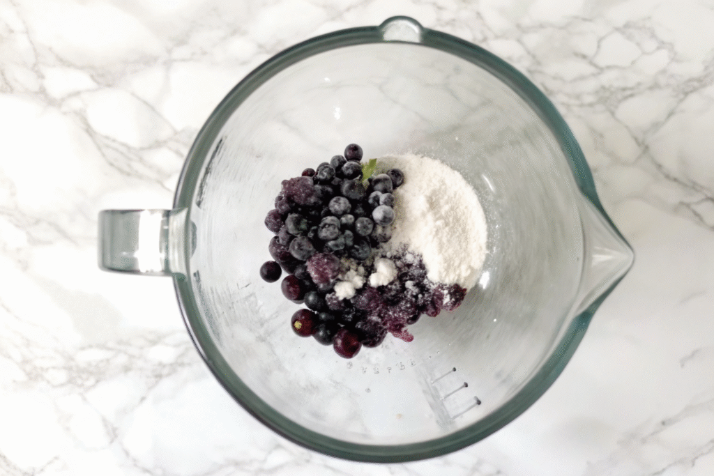 Blending blueberries and cottage cheese for ice cream